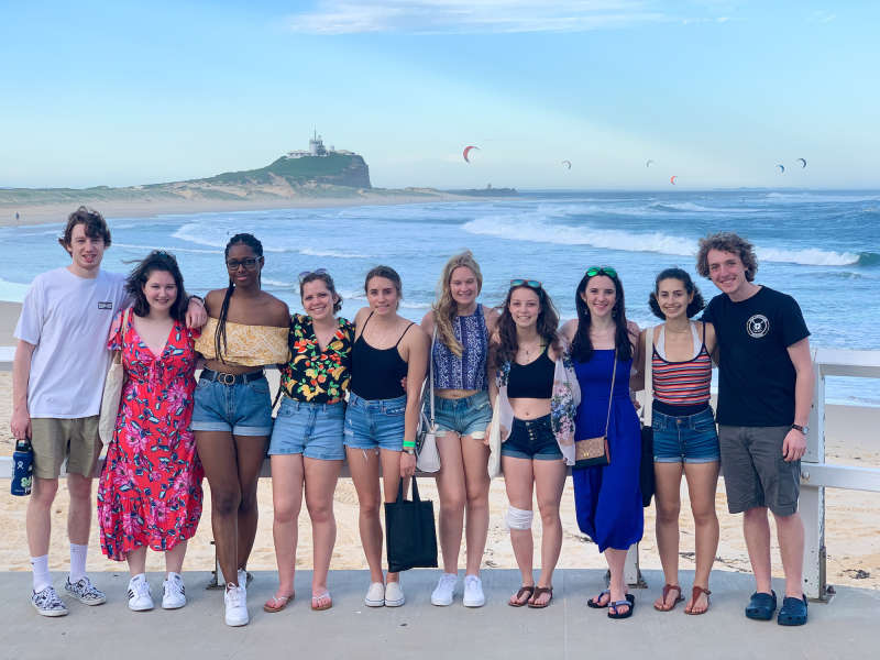 Friends posing at the beach.
