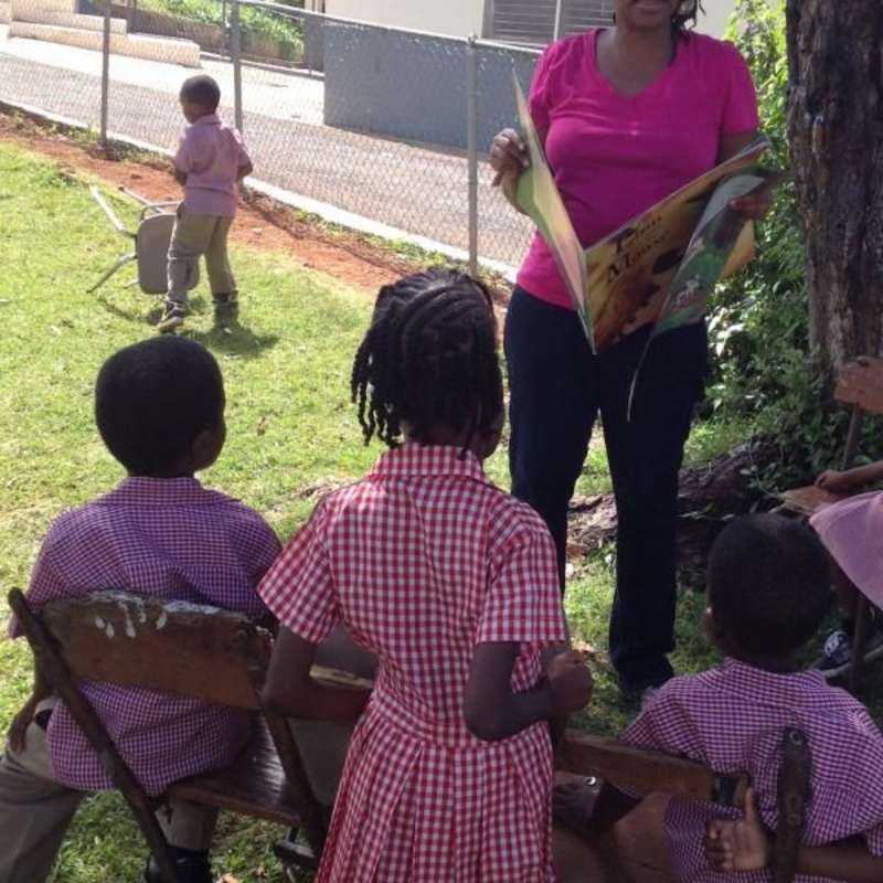 young girls with volunteer