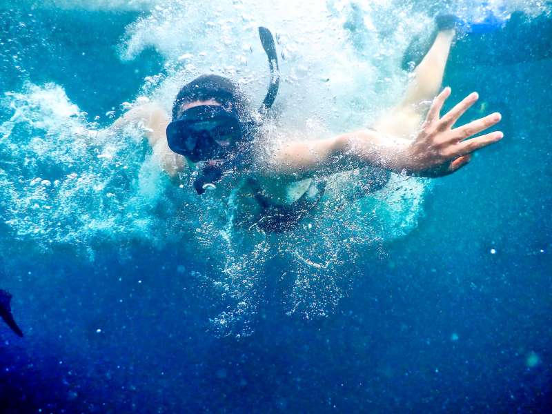 Girl snorkeling in Ecuador