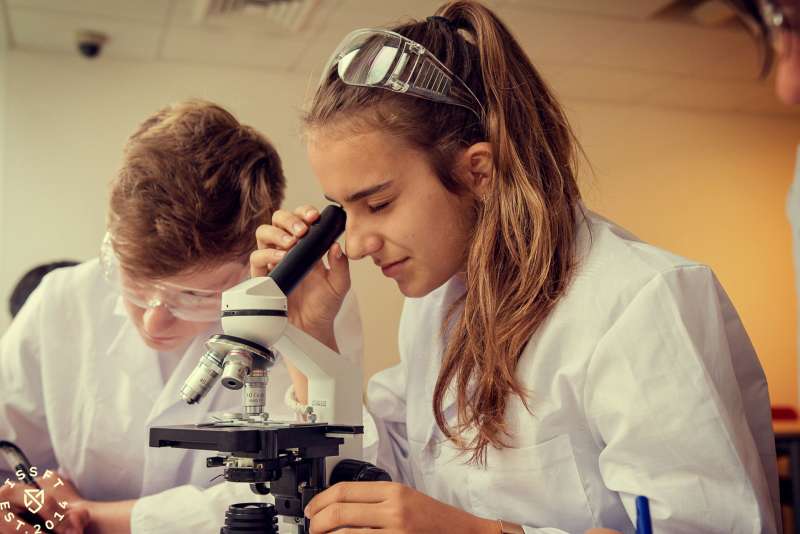 girls with microscope