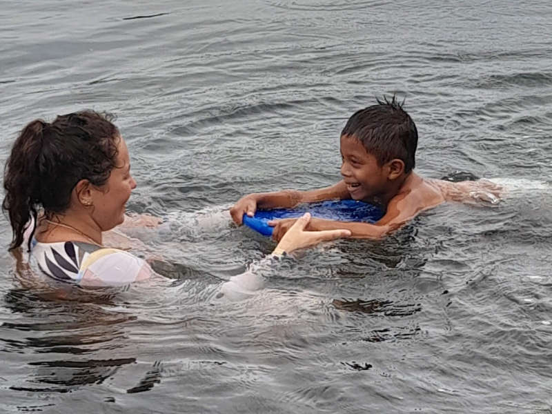 Give and Surf volunteer