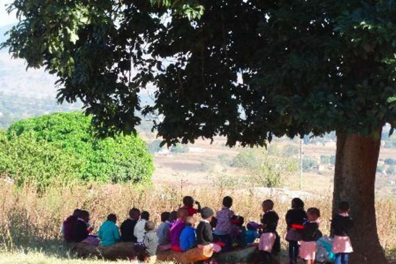 Group breakfast time at pre-school