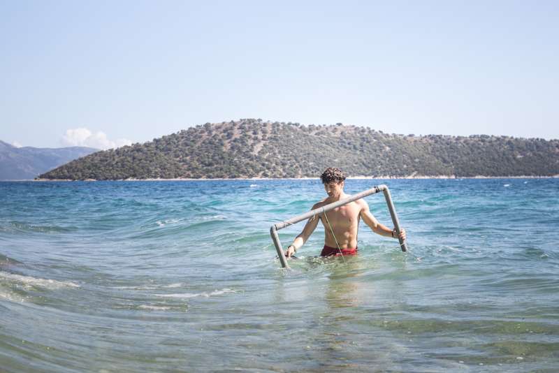 guy working on the beach
