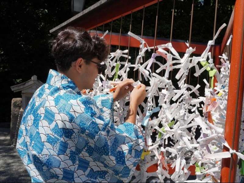 High school participant in traditional Japanese wardrobe at temple