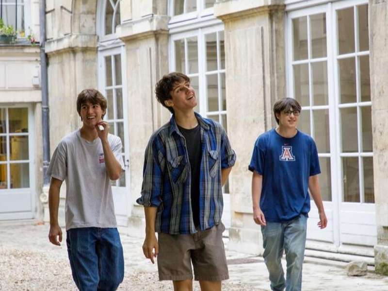 High school students walking in courtyard on program in Paris