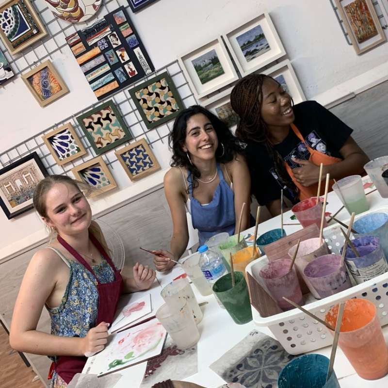 High schoolers painting in Seville