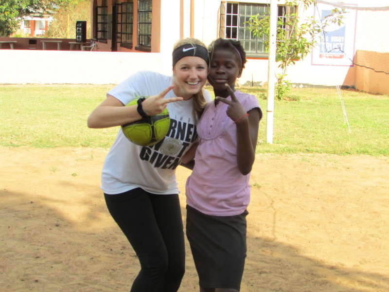 Volunteer and Zambian girl