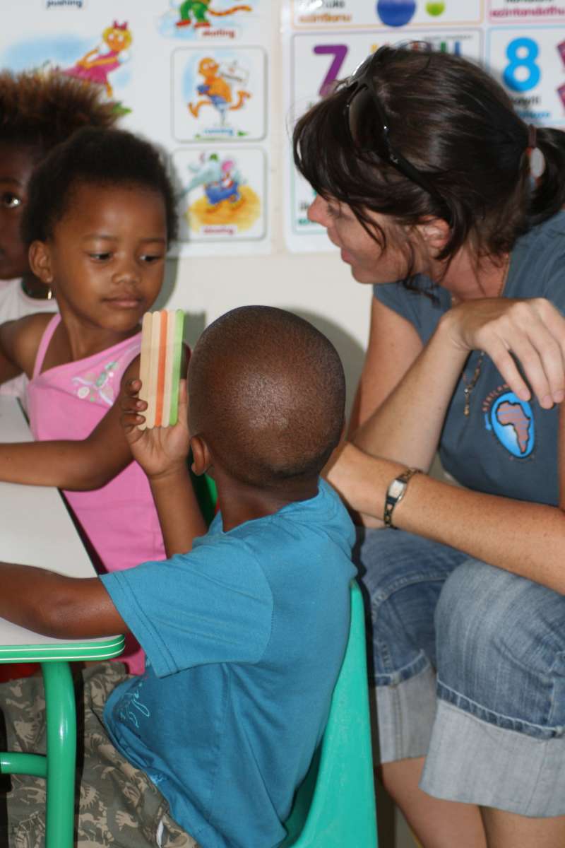 Volunteer with local children in Cape Town