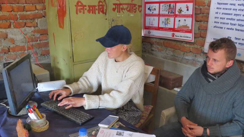 interns working in front of a computer