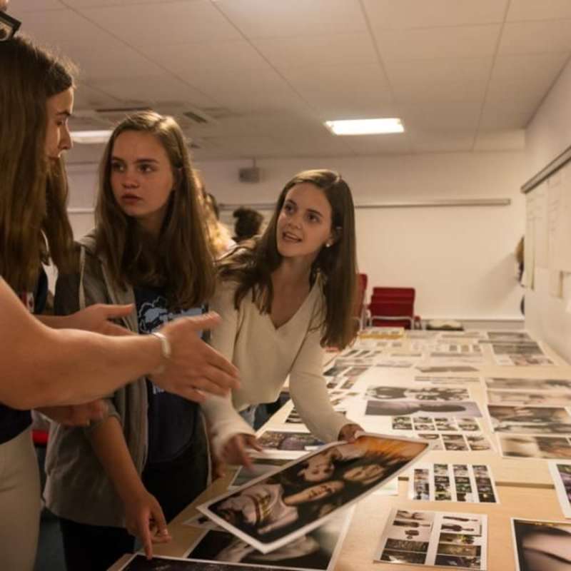 photography students reviewing images