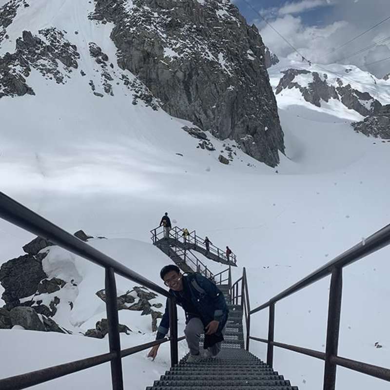 Students Climbing up the Alp Mountains