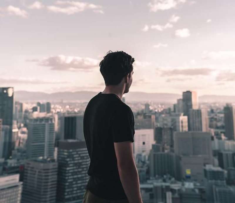 Student in front of Tokyo Skyline View