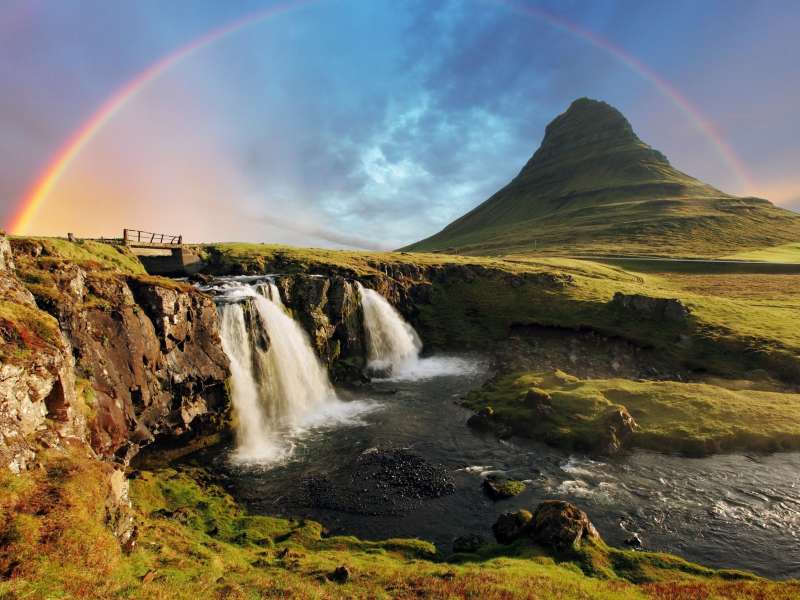 Landscape of waterfalls with rainbow in Iceland