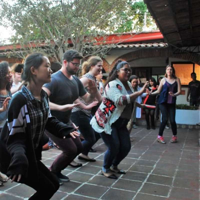 Students learning Latin dance