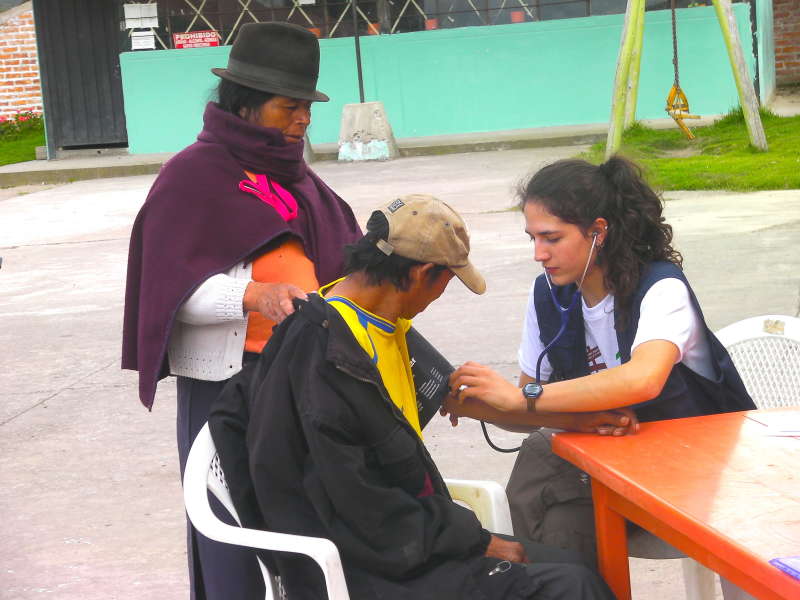 volunteer taking blood pressure