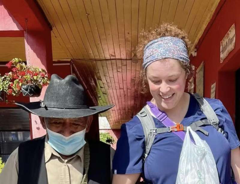 Medical Volunteer helping an Elderly Patient
