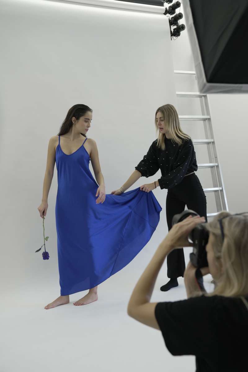 Model, stylist and photographer on set