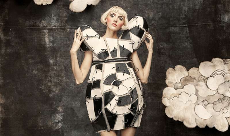 Model wearing student creation for a photo shoot