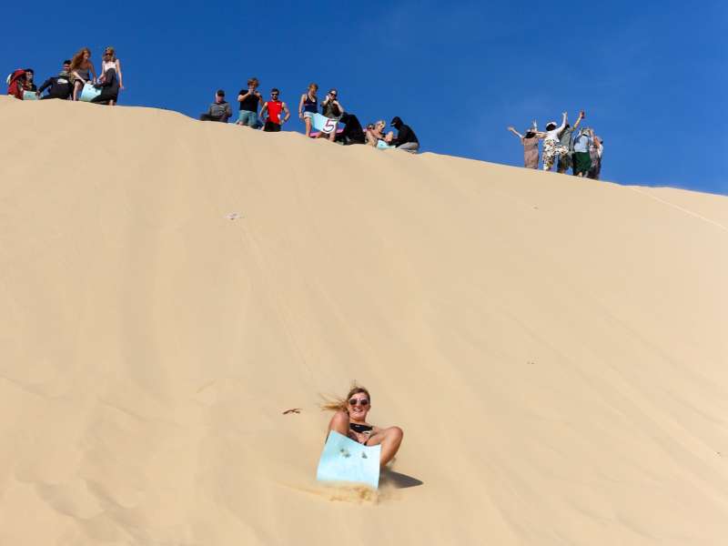 Of course we also have a ton of fun, like dune-sledding in Vietnam.