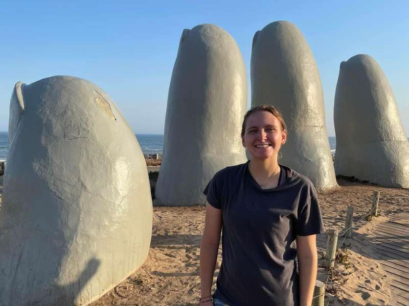 One of our interns posing in front of a sculpture in Uruguay!