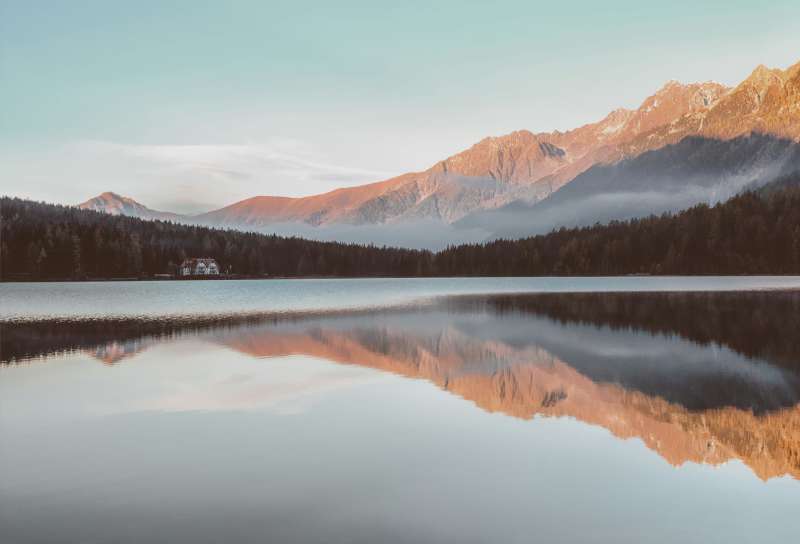 Peaceful mountain lake view in Spain, perfect for RVF teacher getaway.