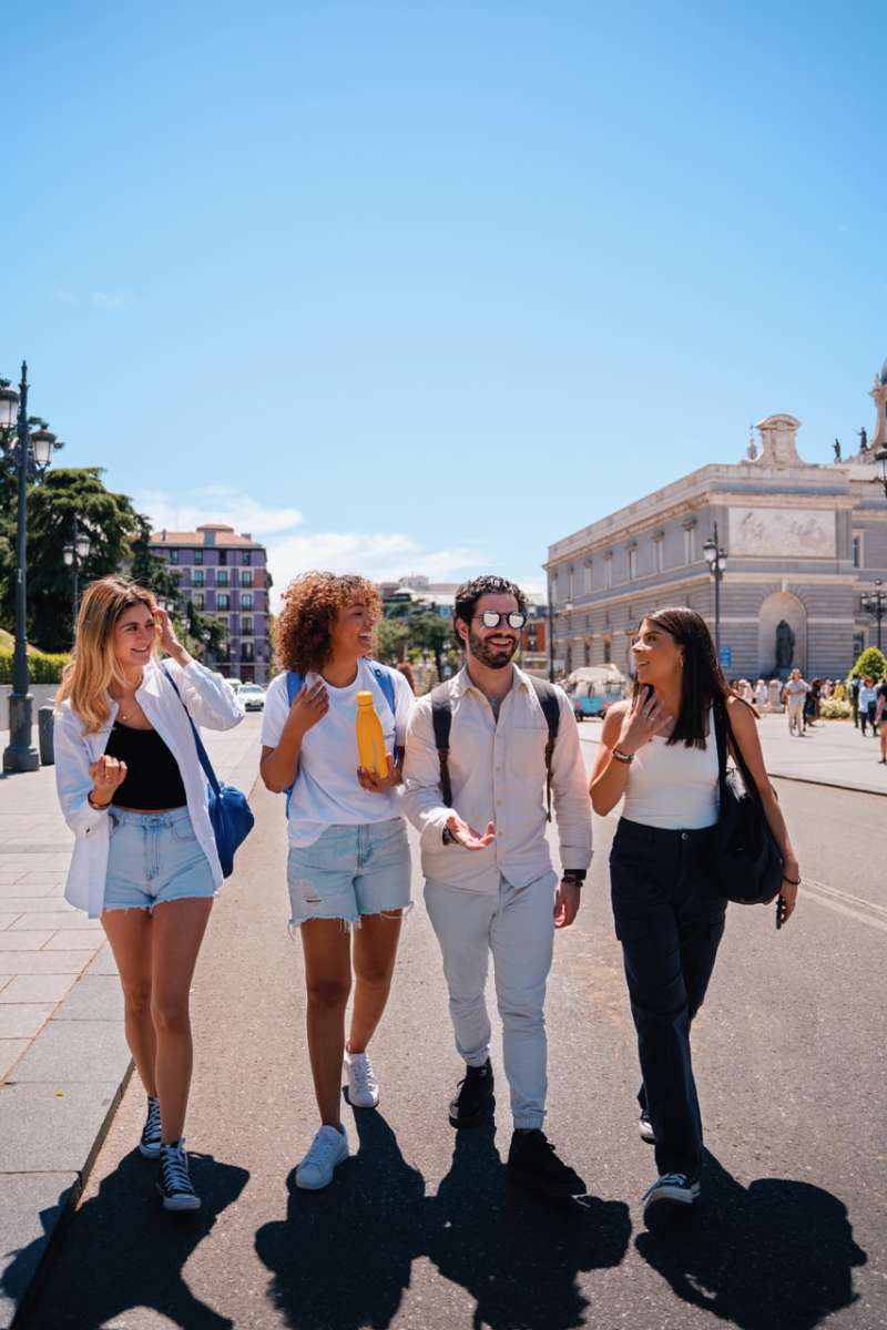 people walking on the street while talking
