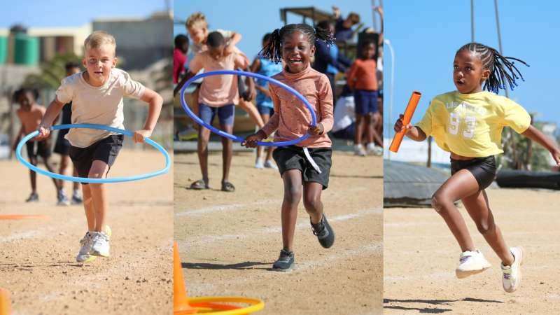 Primary students competing in Sports Day activities.