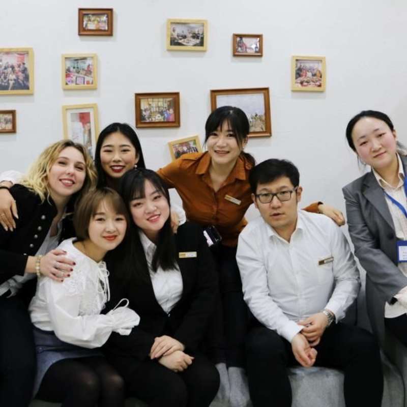 team picture with course advisors and marketing department