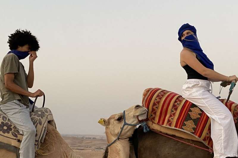 Riding camels in Morocco