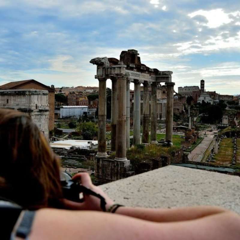 intern taking a picture of the Rome forum