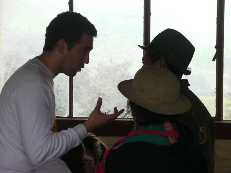 volunteer talking to locals