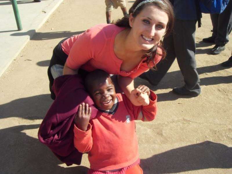 Volunteer and child