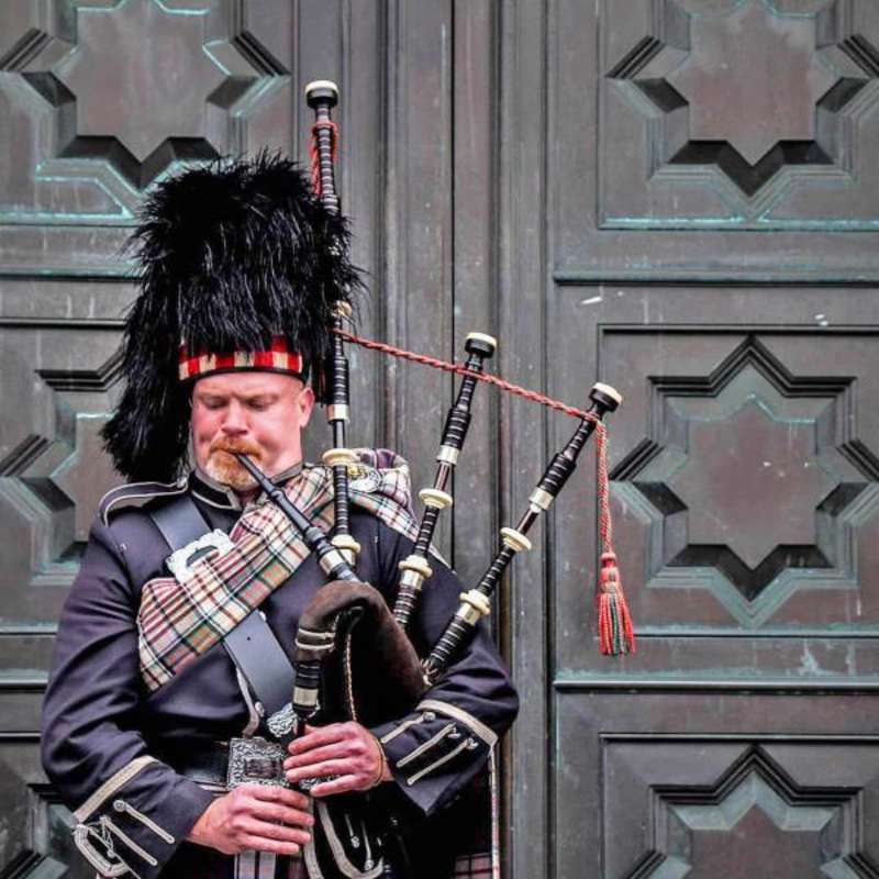 Man playing Bagpipes