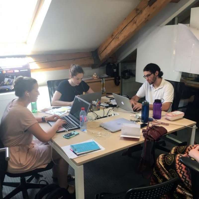 Paris Interns at their desks