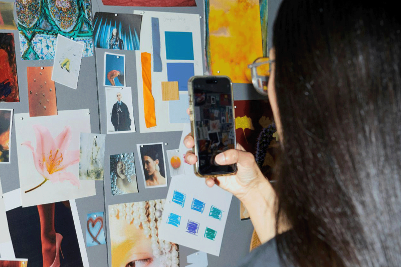 Student creating a mood board
