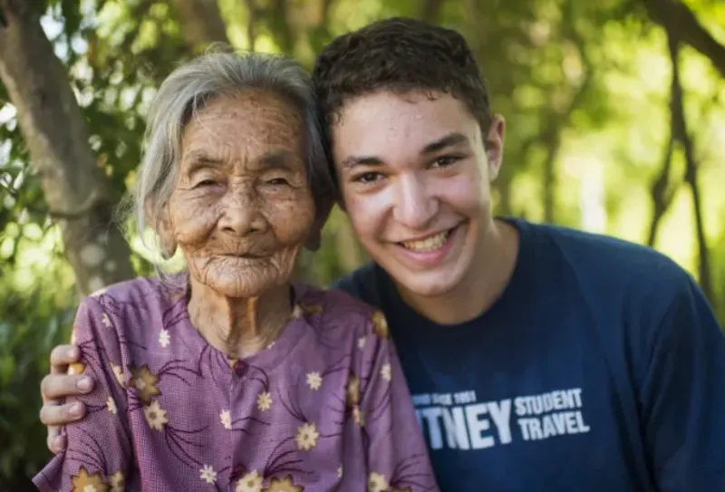 Student hugs local  