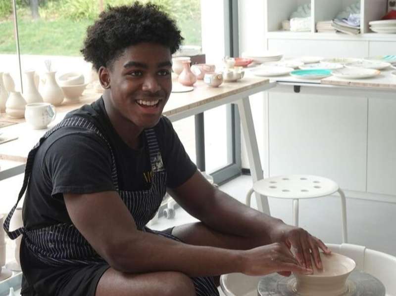 Student in pottery class in Shanghai