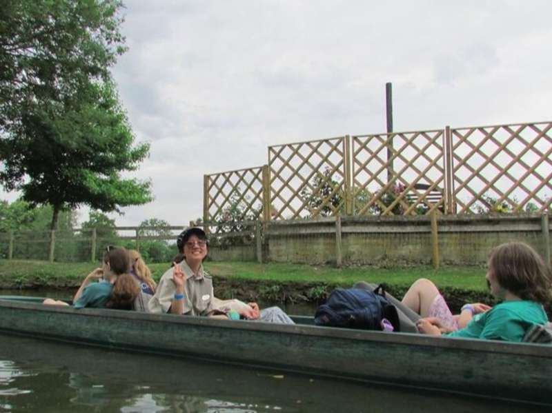 Student on boat in the Thames