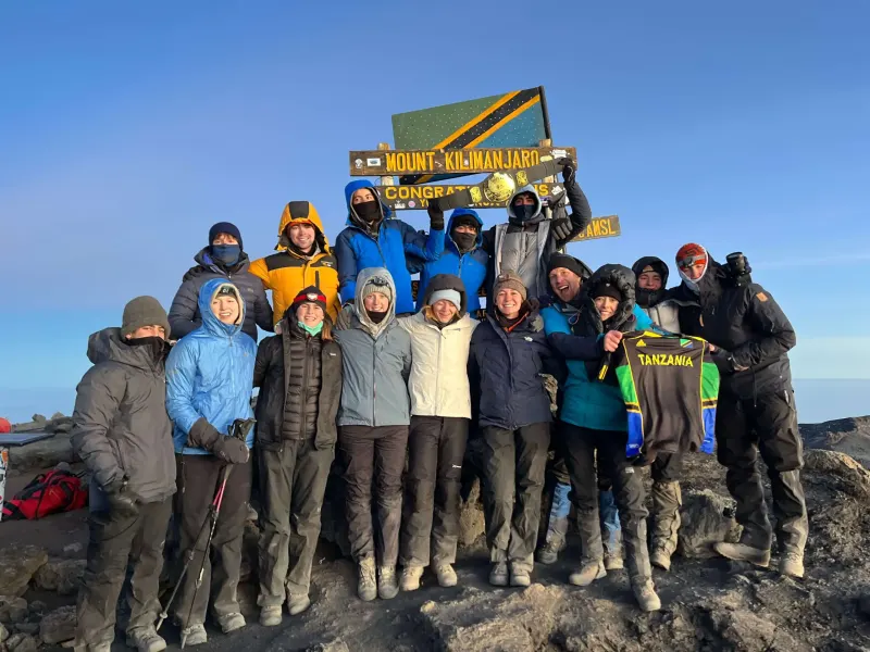 Student pose for photo on Kilimanjaro
