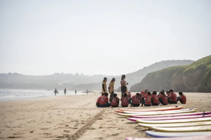 Student sit on the beach