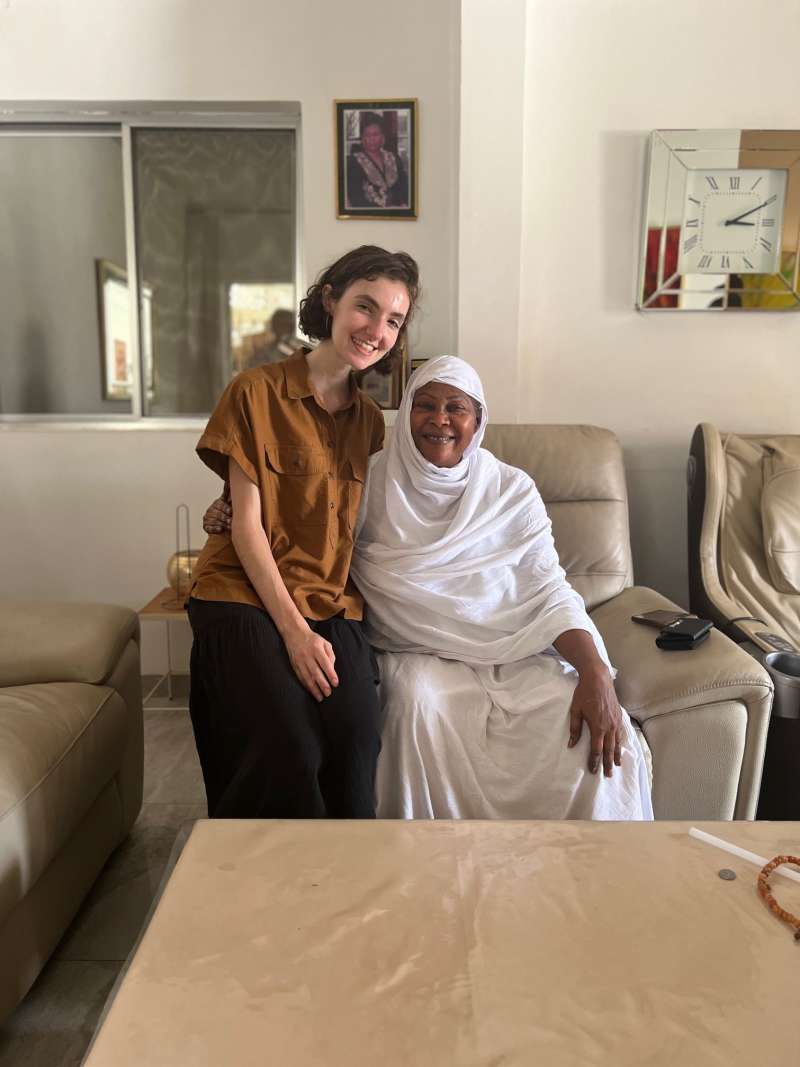 student with her host mother in senegal