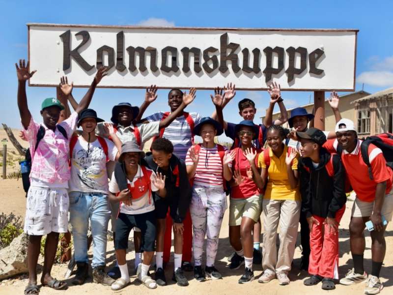 Students at Kolmanskuppe ghost town, Namibia