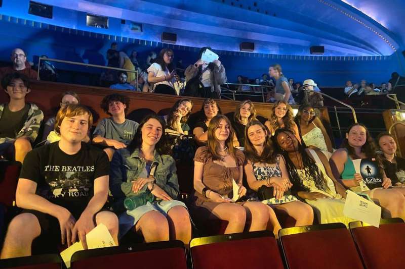Students attending the theatre in London