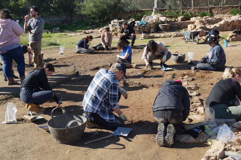 Students digging at excavation site