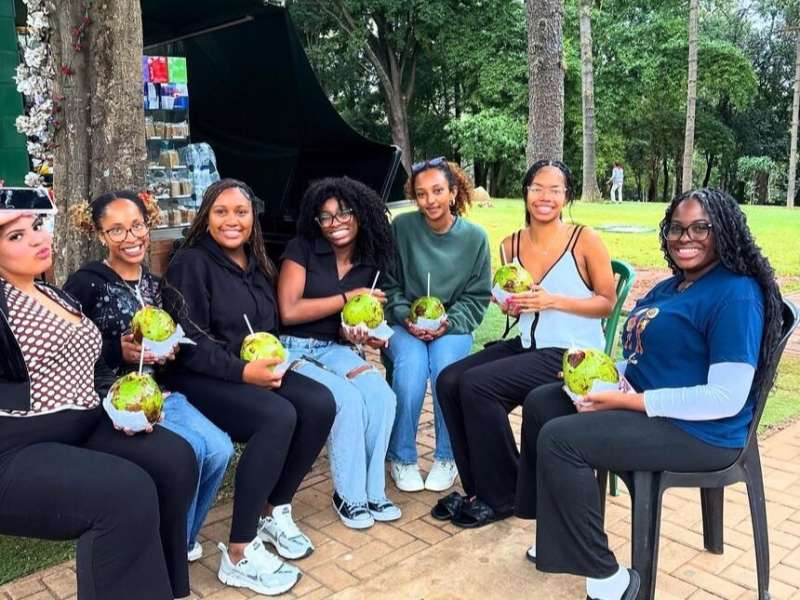 Students drinking coconut water in Sao Paulo