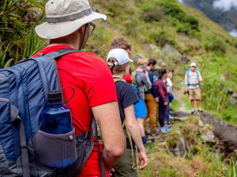 Students hiking mountain in Peru