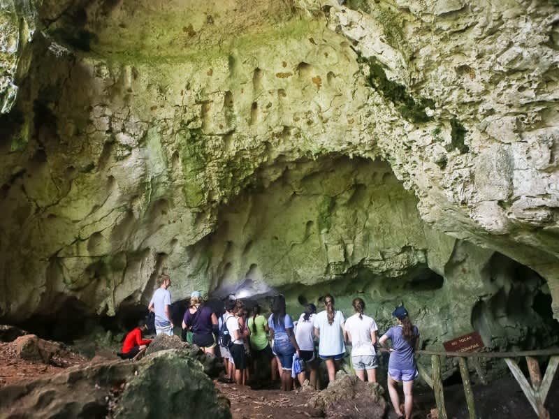 students in cave