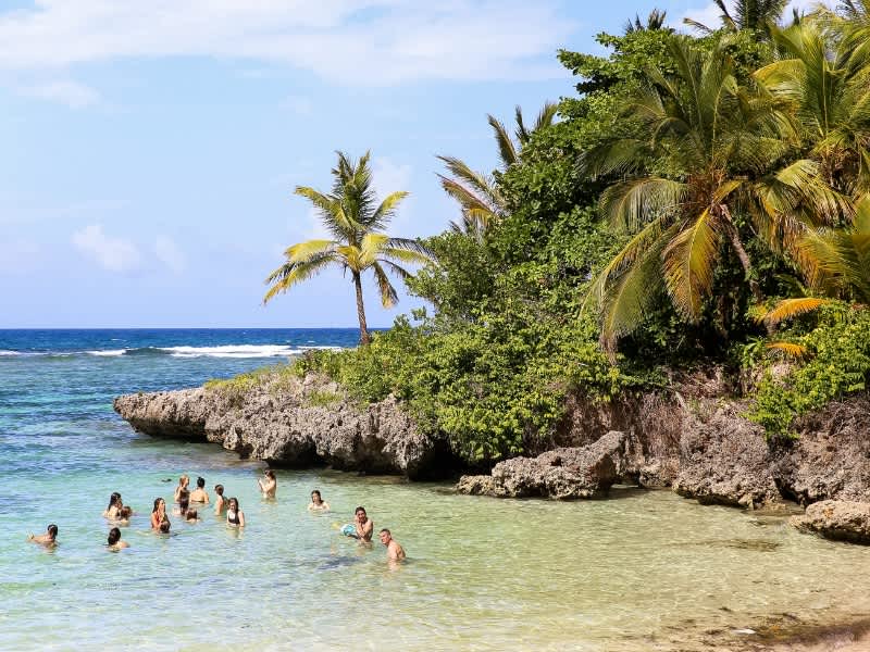 Students in water at beach