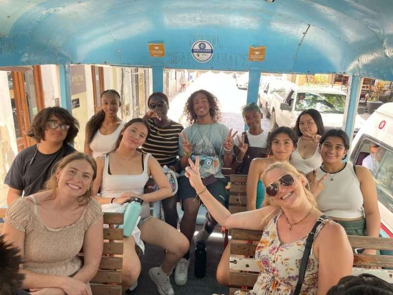 Students on a tour bus in Merida