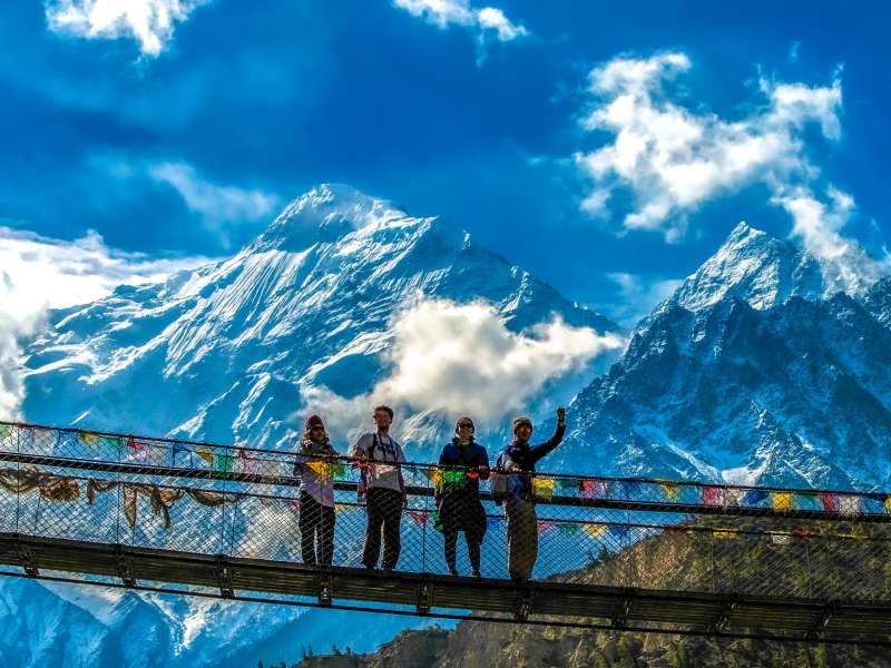 Students on bridge in Nepal